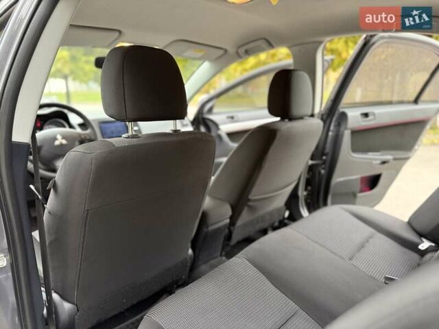 Мицубиси Лансер 2008 в Днепре (Днепропетровске) на Automoto.ua Серый Мицубиси Лансер, объемом двигателя 2 л и пробегом 152 тыс. км за 7999 $, фото 29 на Automoto.ua