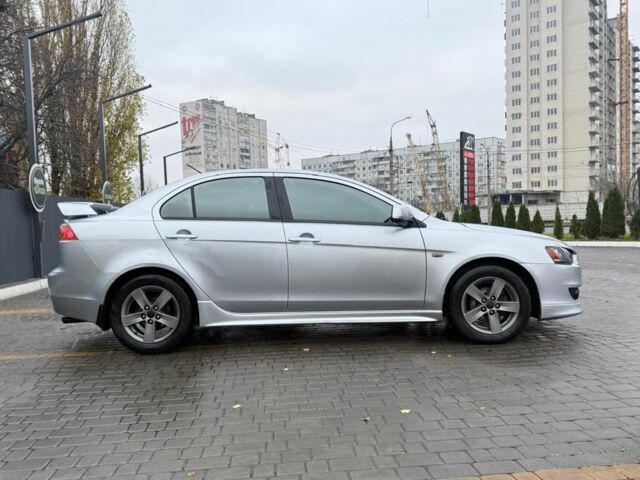 Серый Мицубиси Лансер, объемом двигателя 2 л и пробегом 210 тыс. км за 6500 $, фото 1 на Automoto.ua