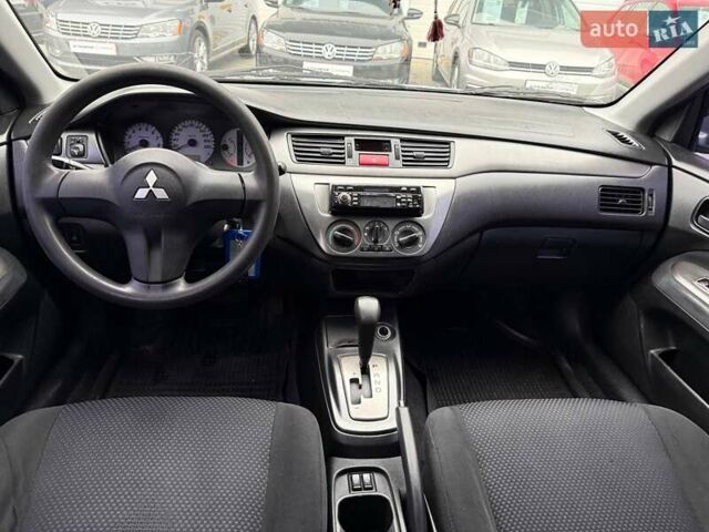 Сірий Міцубісі Lancer, об'ємом двигуна 1.6 л та пробігом 206 тис. км за 4799 $, фото 21 на Automoto.ua