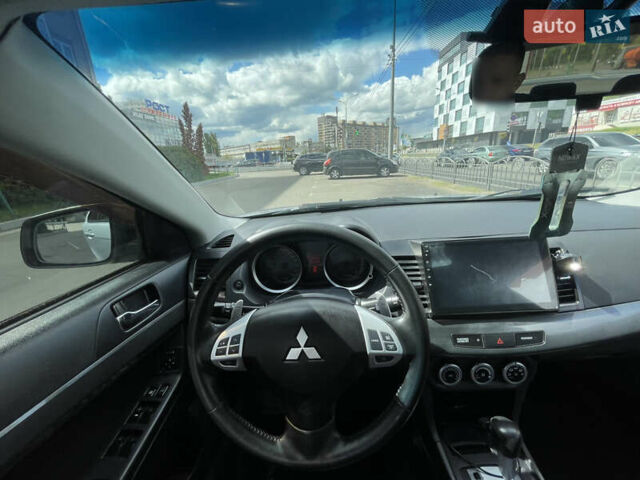 Серый Мицубиси Лансер, объемом двигателя 2 л и пробегом 265 тыс. км за 5500 $, фото 6 на Automoto.ua