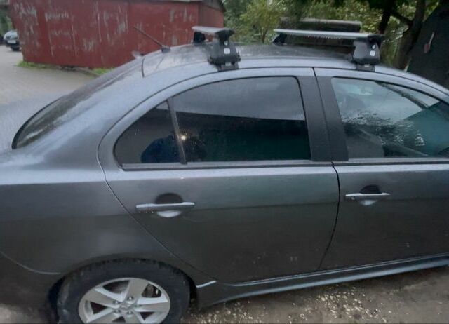 Сірий Міцубісі Lancer, об'ємом двигуна 2 л та пробігом 131 тис. км за 4200 $, фото 1 на Automoto.ua