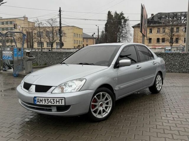 Серый Мицубиси Лансер, объемом двигателя 1.6 л и пробегом 158 тыс. км за 3150 $, фото 3 на Automoto.ua