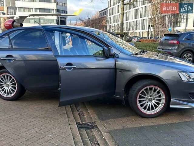 Сірий Міцубісі Lancer, об'ємом двигуна 1.5 л та пробігом 200 тис. км за 6400 $, фото 3 на Automoto.ua