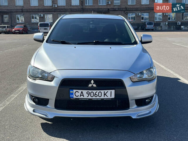 Сірий Міцубісі Lancer, об'ємом двигуна 2 л та пробігом 237 тис. км за 7200 $, фото 11 на Automoto.ua
