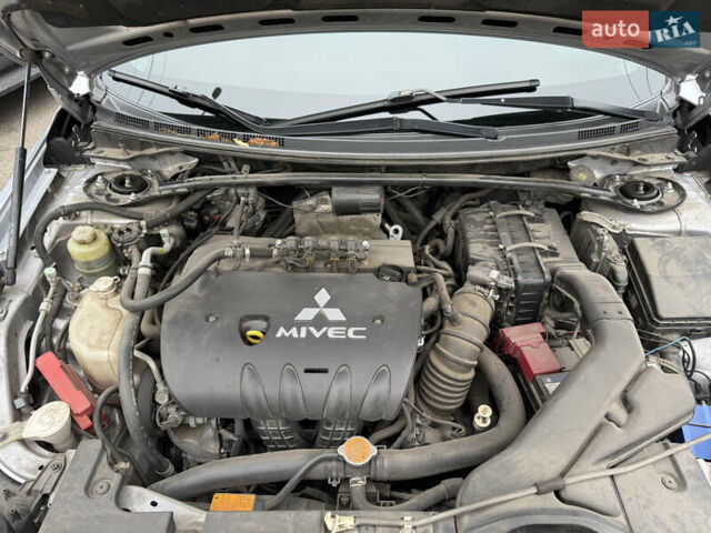 Сірий Міцубісі Lancer, об'ємом двигуна 2 л та пробігом 253 тис. км за 8700 $, фото 48 на Automoto.ua