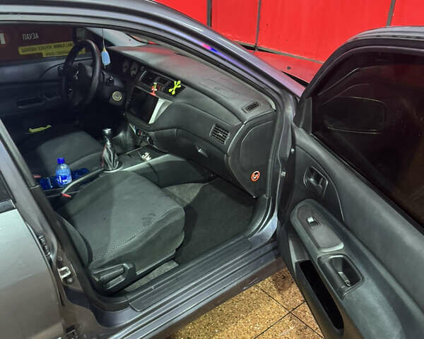 Серый Мицубиси Лансер, объемом двигателя 1.6 л и пробегом 268 тыс. км за 4600 $, фото 6 на Automoto.ua