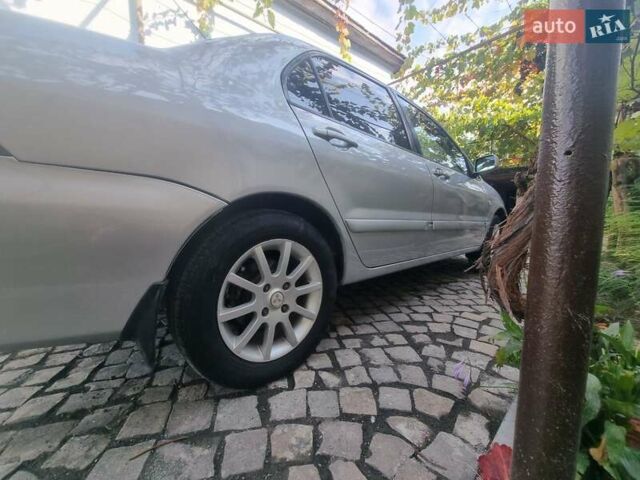 Сірий Міцубісі Lancer, об'ємом двигуна 1.6 л та пробігом 290 тис. км за 3850 $, фото 9 на Automoto.ua