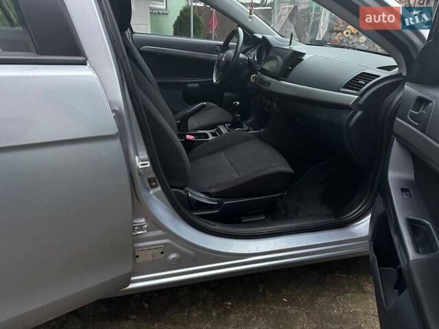 Серый Мицубиси Лансер, объемом двигателя 1.5 л и пробегом 147 тыс. км за 6700 $, фото 11 на Automoto.ua