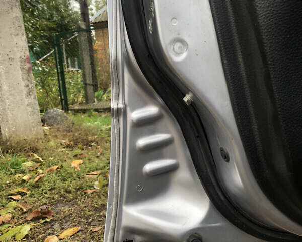 Сірий Міцубісі Lancer, об'ємом двигуна 1.58 л та пробігом 240 тис. км за 4299 $, фото 13 на Automoto.ua