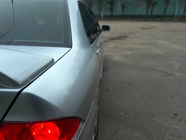 Сірий Міцубісі Lancer, об'ємом двигуна 1.6 л та пробігом 254 тис. км за 3800 $, фото 10 на Automoto.ua