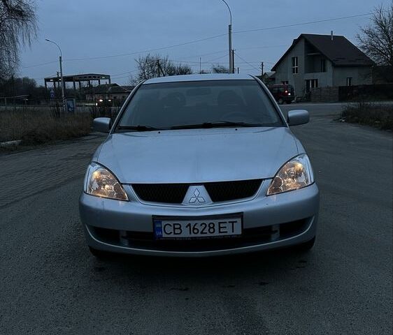 Сірий Міцубісі Lancer, об'ємом двигуна 1.6 л та пробігом 180 тис. км за 3900 $, фото 7 на Automoto.ua