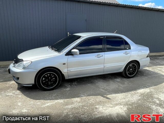 Сірий Міцубісі Lancer, об'ємом двигуна 1.6 л та пробігом 193 тис. км за 4500 $, фото 2 на Automoto.ua