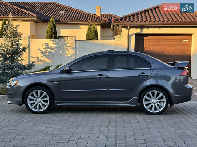Сірий Міцубісі Lancer, об'ємом двигуна 2 л та пробігом 92 тис. км за 9800 $, фото 30 на Automoto.ua