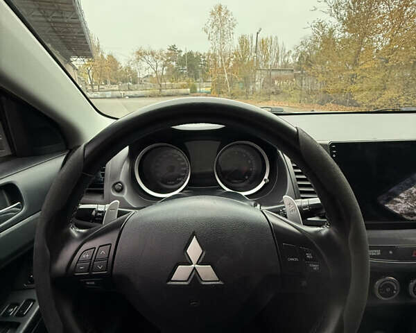 Сірий Міцубісі Lancer, об'ємом двигуна 2 л та пробігом 253 тис. км за 8700 $, фото 24 на Automoto.ua