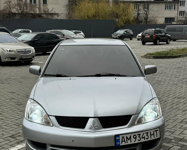 Сірий Міцубісі Lancer, об'ємом двигуна 1.6 л та пробігом 269 тис. км за 3999 $, фото 5 на Automoto.ua