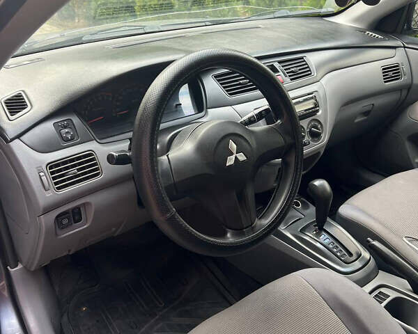 Мицубиси Лансер 2008 в Днепре (Днепропетровске) на Automoto.ua Серый Мицубиси Лансер, объемом двигателя 1.3 л и пробегом 220 тыс. км за 6000 $, фото 7 на Automoto.ua