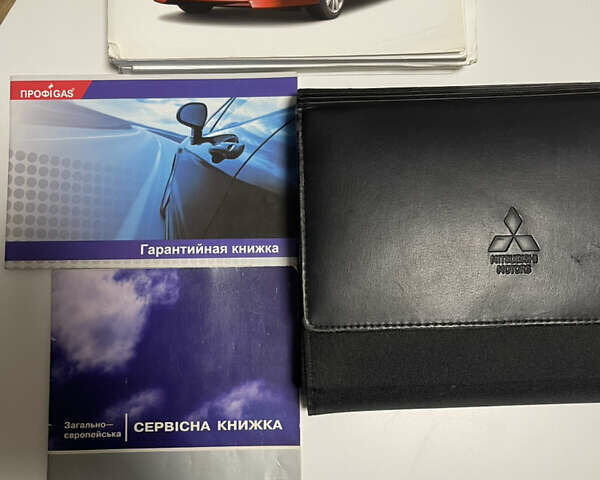 Сірий Міцубісі Lancer, об'ємом двигуна 2 л та пробігом 234 тис. км за 7200 $, фото 19 на Automoto.ua