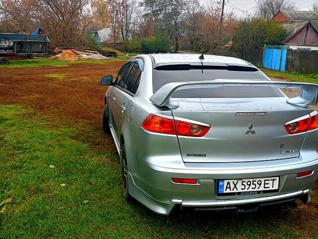 Сірий Міцубісі Lancer, об'ємом двигуна 2 л та пробігом 320 тис. км за 7999 $, фото 5 на Automoto.ua