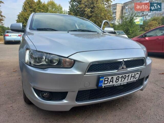 Серый Мицубиси Лансер, объемом двигателя 2 л и пробегом 103 тыс. км за 7700 $, фото 1 на Automoto.ua
