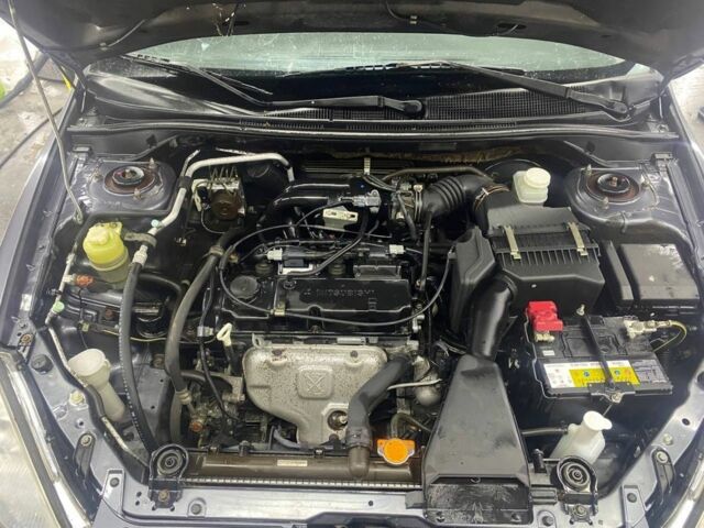 Серый Мицубиси Лансер, объемом двигателя 1.6 л и пробегом 100 тыс. км за 2500 $, фото 2 на Automoto.ua