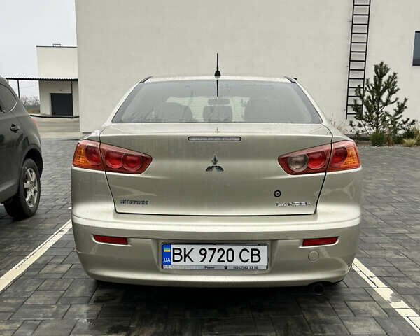 Сірий Міцубісі Lancer, об'ємом двигуна 2 л та пробігом 230 тис. км за 6800 $, фото 11 на Automoto.ua