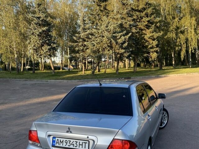 Сірий Міцубісі Lancer, об'ємом двигуна 1.6 л та пробігом 211 тис. км за 3899 $, фото 5 на Automoto.ua