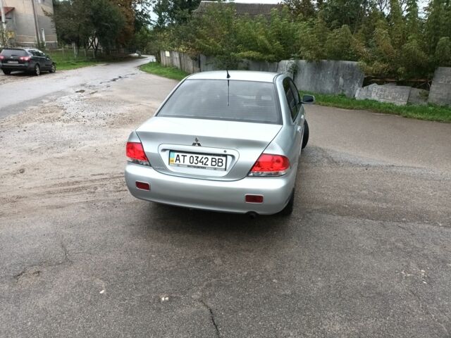 Сірий Міцубісі Lancer, об'ємом двигуна 1.6 л та пробігом 224 тис. км за 3100 $, фото 4 на Automoto.ua