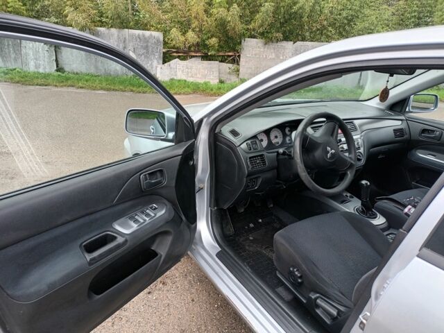 Сірий Міцубісі Lancer, об'ємом двигуна 1.6 л та пробігом 224 тис. км за 3100 $, фото 7 на Automoto.ua
