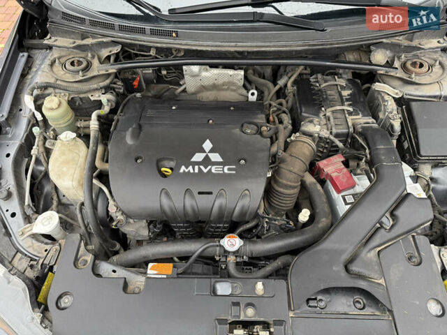 Сірий Міцубісі Lancer, об'ємом двигуна 2 л та пробігом 92 тис. км за 8200 $, фото 47 на Automoto.ua