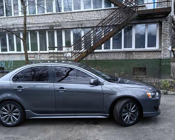 Сірий Міцубісі Lancer, об'ємом двигуна 2 л та пробігом 186 тис. км за 6000 $, фото 6 на Automoto.ua