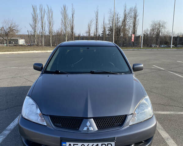 Сірий Міцубісі Lancer, об'ємом двигуна 1.6 л та пробігом 216 тис. км за 5300 $, фото 3 на Automoto.ua