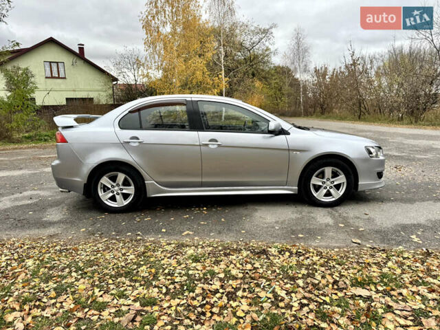 Сірий Міцубісі Lancer, об'ємом двигуна 2 л та пробігом 225 тис. км за 6890 $, фото 7 на Automoto.ua