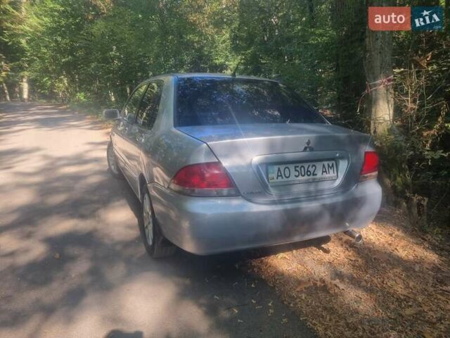 Сірий Міцубісі Lancer, об'ємом двигуна 1.6 л та пробігом 290 тис. км за 3850 $, фото 5 на Automoto.ua
