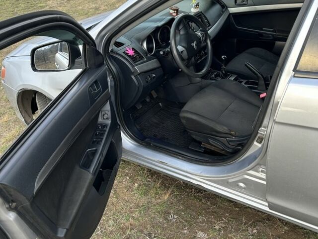 Серый Мицубиси Лансер, объемом двигателя 1.5 л и пробегом 321 тыс. км за 3900 $, фото 4 на Automoto.ua