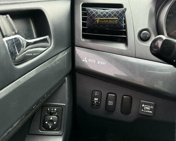 Сірий Міцубісі Lancer, об'ємом двигуна 2 л та пробігом 253 тис. км за 8700 $, фото 26 на Automoto.ua