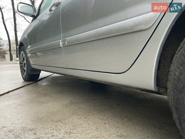 Сірий Міцубісі Lancer, об'ємом двигуна 1.58 л та пробігом 220 тис. км за 5900 $, фото 7 на Automoto.ua