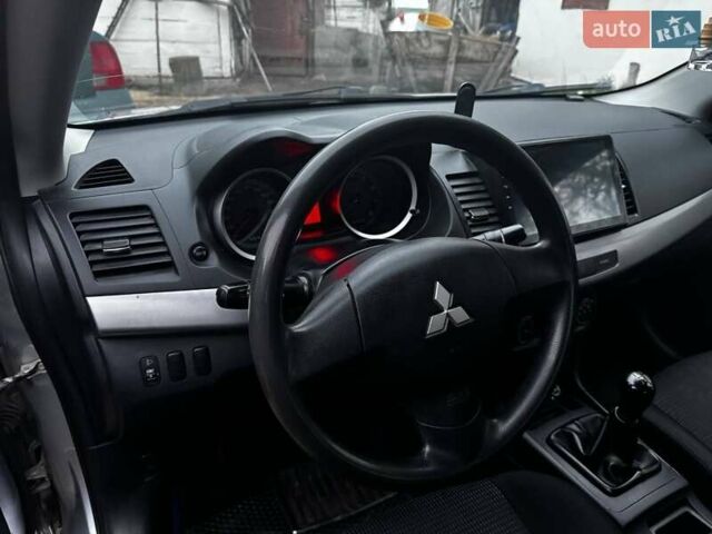 Серый Мицубиси Лансер, объемом двигателя 1.5 л и пробегом 147 тыс. км за 6700 $, фото 16 на Automoto.ua