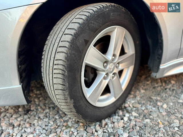 Сірий Міцубісі Lancer, об'ємом двигуна 2 л та пробігом 223 тис. км за 7390 $, фото 8 на Automoto.ua