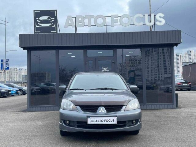 Серый Мицубиси Лансер, объемом двигателя 1.6 л и пробегом 146 тыс. км за 5990 $, фото 2 на Automoto.ua