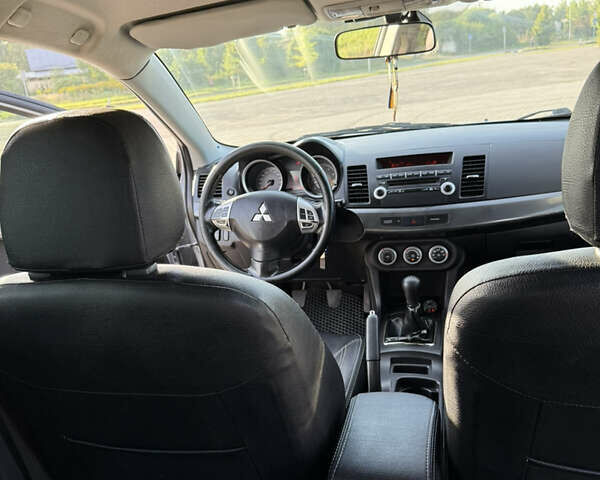 Сірий Міцубісі Lancer, об'ємом двигуна 2 л та пробігом 250 тис. км за 5999 $, фото 11 на Automoto.ua