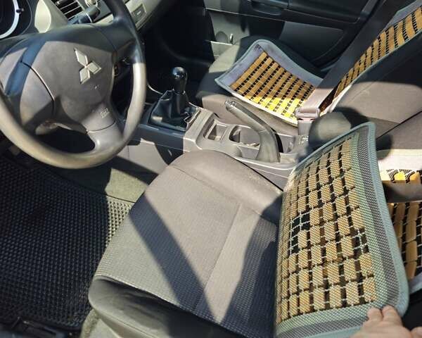 Серый Мицубиси Лансер, объемом двигателя 1.5 л и пробегом 219 тыс. км за 4700 $, фото 17 на Automoto.ua