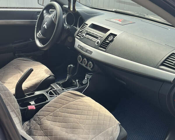 Сірий Міцубісі Lancer, об'ємом двигуна 1.8 л та пробігом 207 тис. км за 5800 $, фото 5 на Automoto.ua