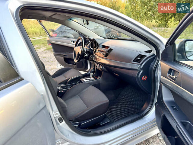 Сірий Міцубісі Lancer, об'ємом двигуна 2 л та пробігом 223 тис. км за 7390 $, фото 17 на Automoto.ua