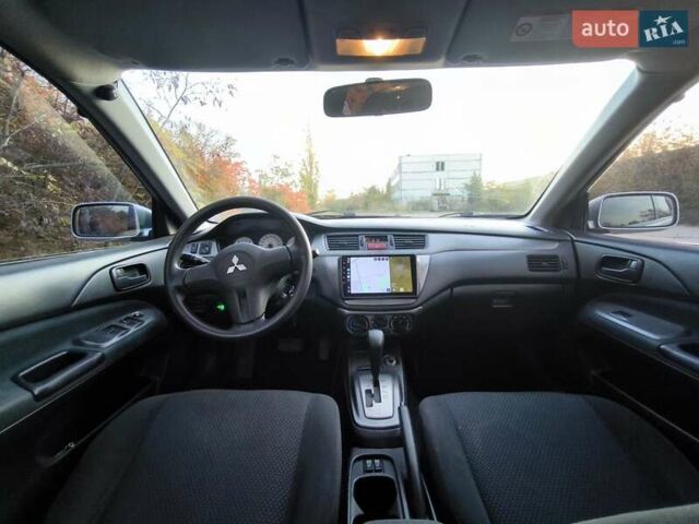 Серый Мицубиси Лансер, объемом двигателя 1.58 л и пробегом 145 тыс. км за 4800 $, фото 4 на Automoto.ua