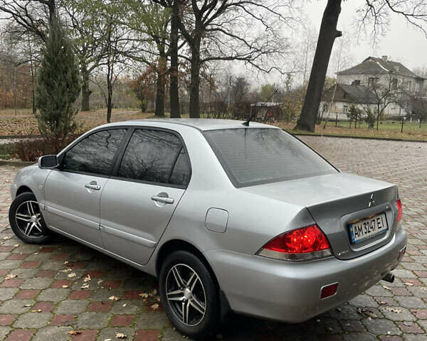 Сірий Міцубісі Lancer, об'ємом двигуна 1.59 л та пробігом 219 тис. км за 4500 $, фото 7 на Automoto.ua