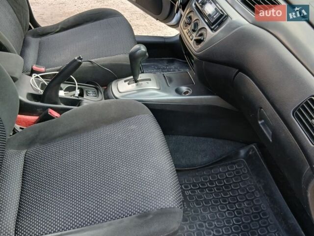 Серый Мицубиси Лансер, объемом двигателя 1.6 л и пробегом 162 тыс. км за 4300 $, фото 14 на Automoto.ua