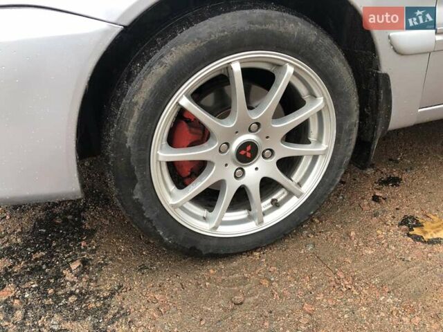 Серый Мицубиси Лансер, объемом двигателя 1.58 л и пробегом 268 тыс. км за 3450 $, фото 7 на Automoto.ua