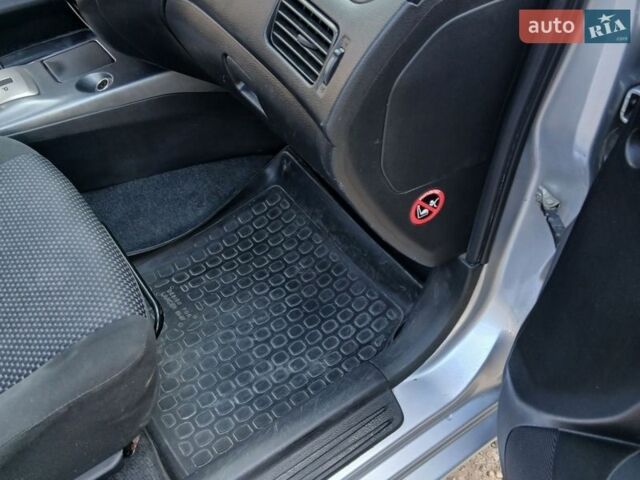 Серый Мицубиси Лансер, объемом двигателя 1.6 л и пробегом 162 тыс. км за 4300 $, фото 13 на Automoto.ua