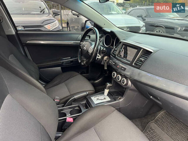 Міцубісі Lancer 2008 у Полтаві на Automoto.ua Сірий Міцубісі Lancer, об'ємом двигуна 2 л та пробігом 230 тис. км за 6600 $, фото 12 на Automoto.ua