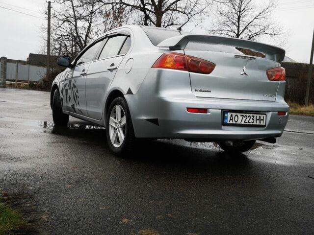 Серый Мицубиси Лансер, объемом двигателя 2 л и пробегом 260 тыс. км за 5200 $, фото 7 на Automoto.ua